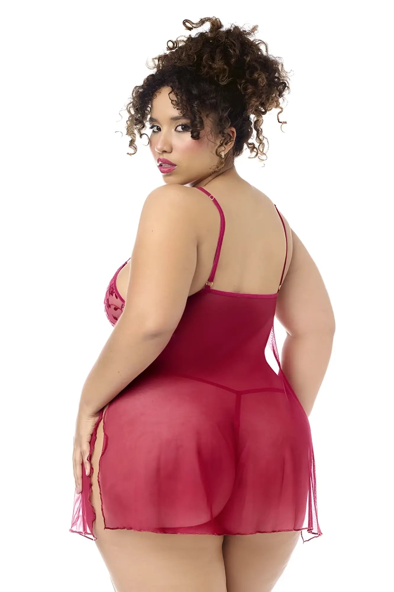 A plus-size woman wears a sheer deep red mapale 7620x babydoll with lace bodice and thin spaghetti straps with matching panty