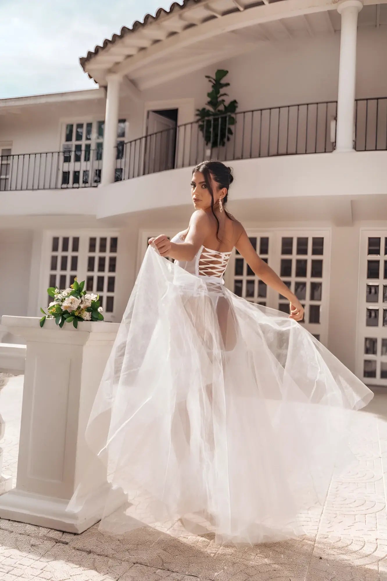 Back view of mapale 8933 white wedding gown with lace-up corset and sheer tulle skirt in four piece set