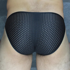 Mckillop MCKVKPL bikini brief in black mesh with a subtle white dot pattern showcasing the front side