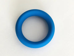 A solid blue silicone ring with a smooth matte finish from meat rack collection