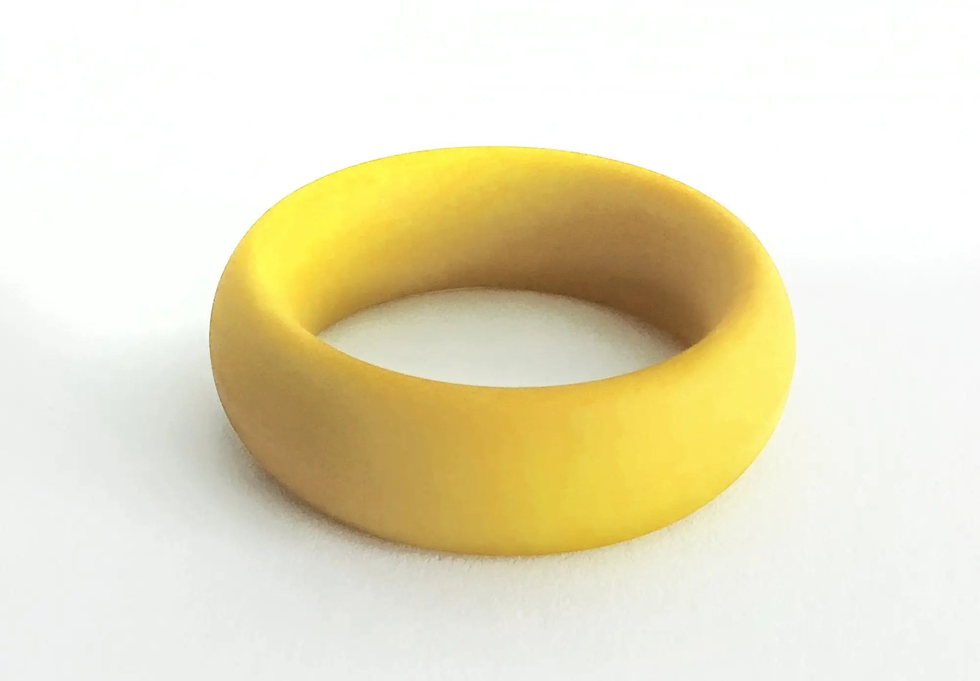 A smooth solid yellow silicone ring with a matte finish from meat rack collection