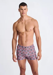 Medallions seersucker swim shorts with mesh lining in vibrant purple red and blue geometric pattern for men