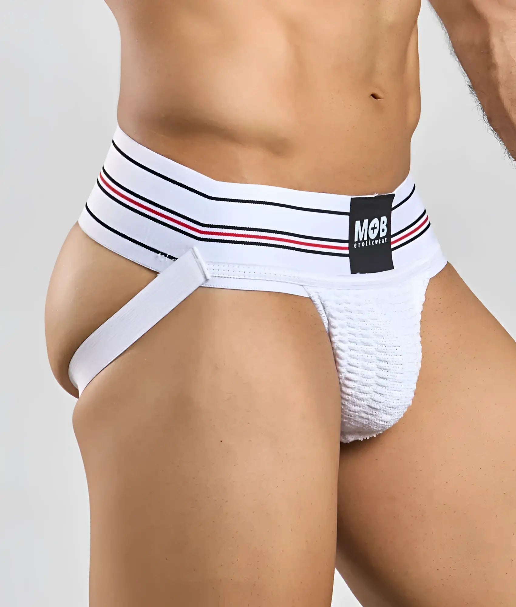 White textured athletic briefs with a black and red striped waistband branded mob in men 3 inch wide classic jockstrap style