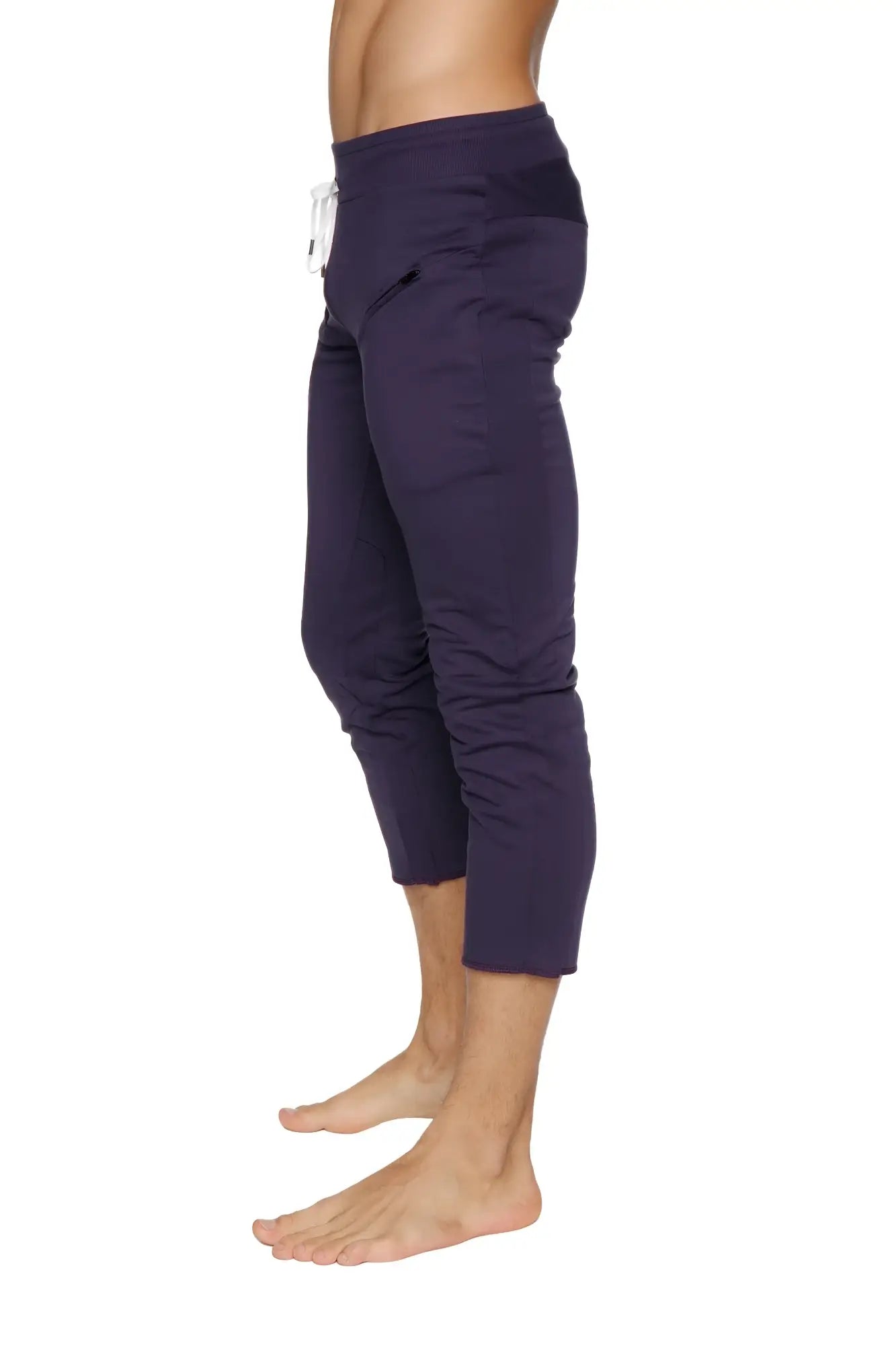 Mens navy blue capri yoga pants with white drawstring waistband and side pockets in eggplant color