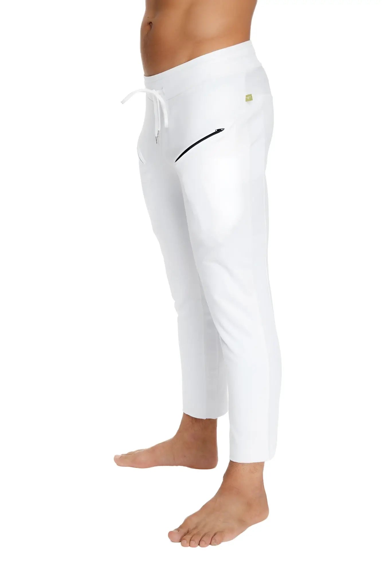 Mens white athletic joggers with drawstring waistband and black zipper detail on side pocket for yoga and casual wear