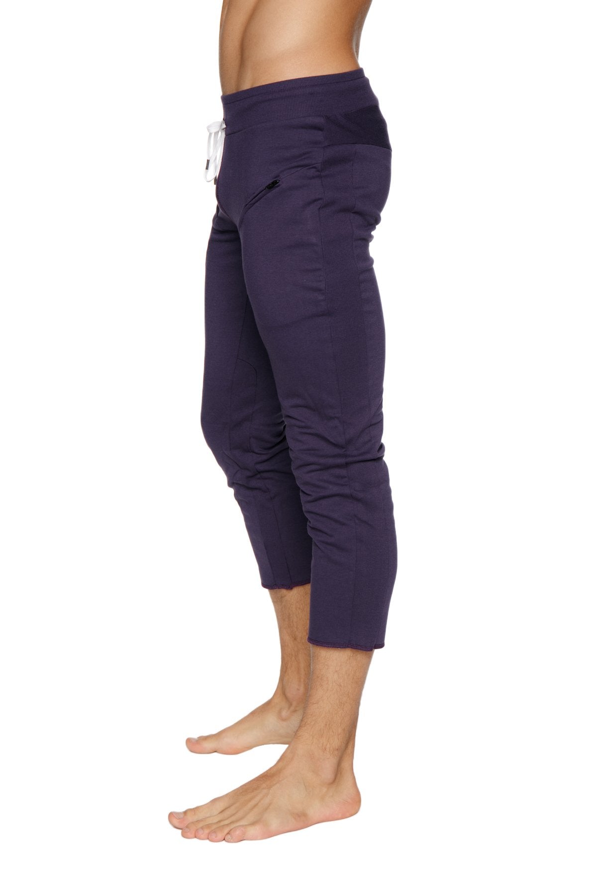 Mens navy blue capri yoga pants with white drawstring waistband and side pockets in eggplant color