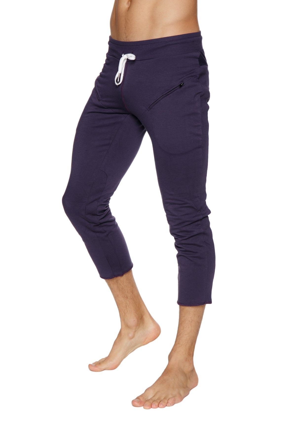 Mens navy blue capri joggers with white drawstring waistband and side pockets for yoga and casual wear