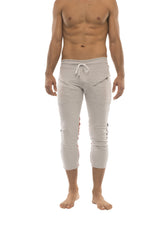 Mens 4/5 zipper pocket capri yoga pants in light gray with white drawstring waistband and zipper pockets