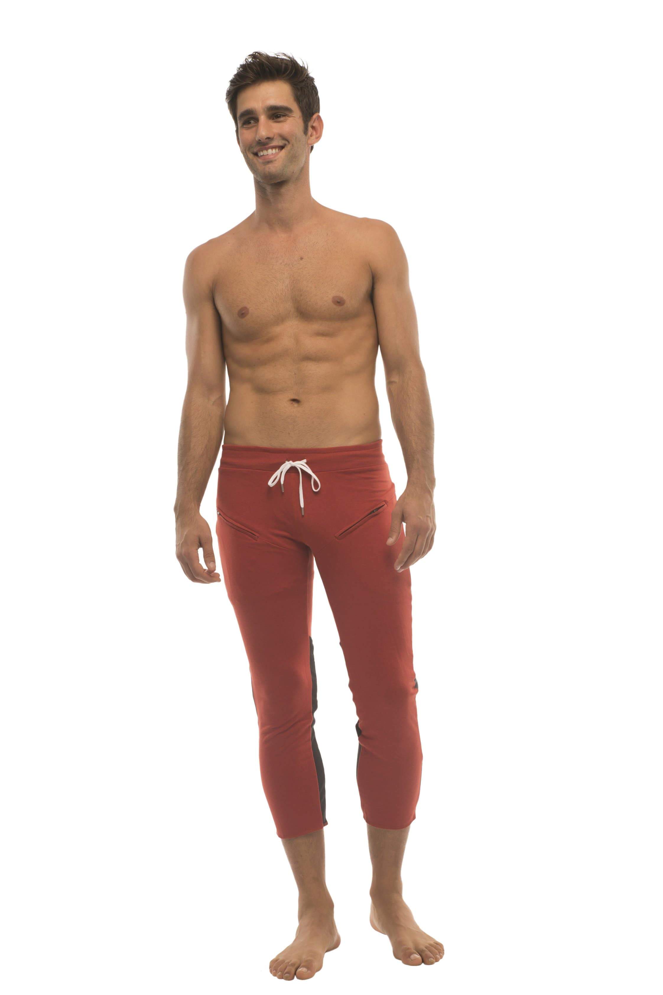 Mens 4/5 zipper pocket capri yoga pants in red with charcoal and black featuring white drawstring waistband and black panels