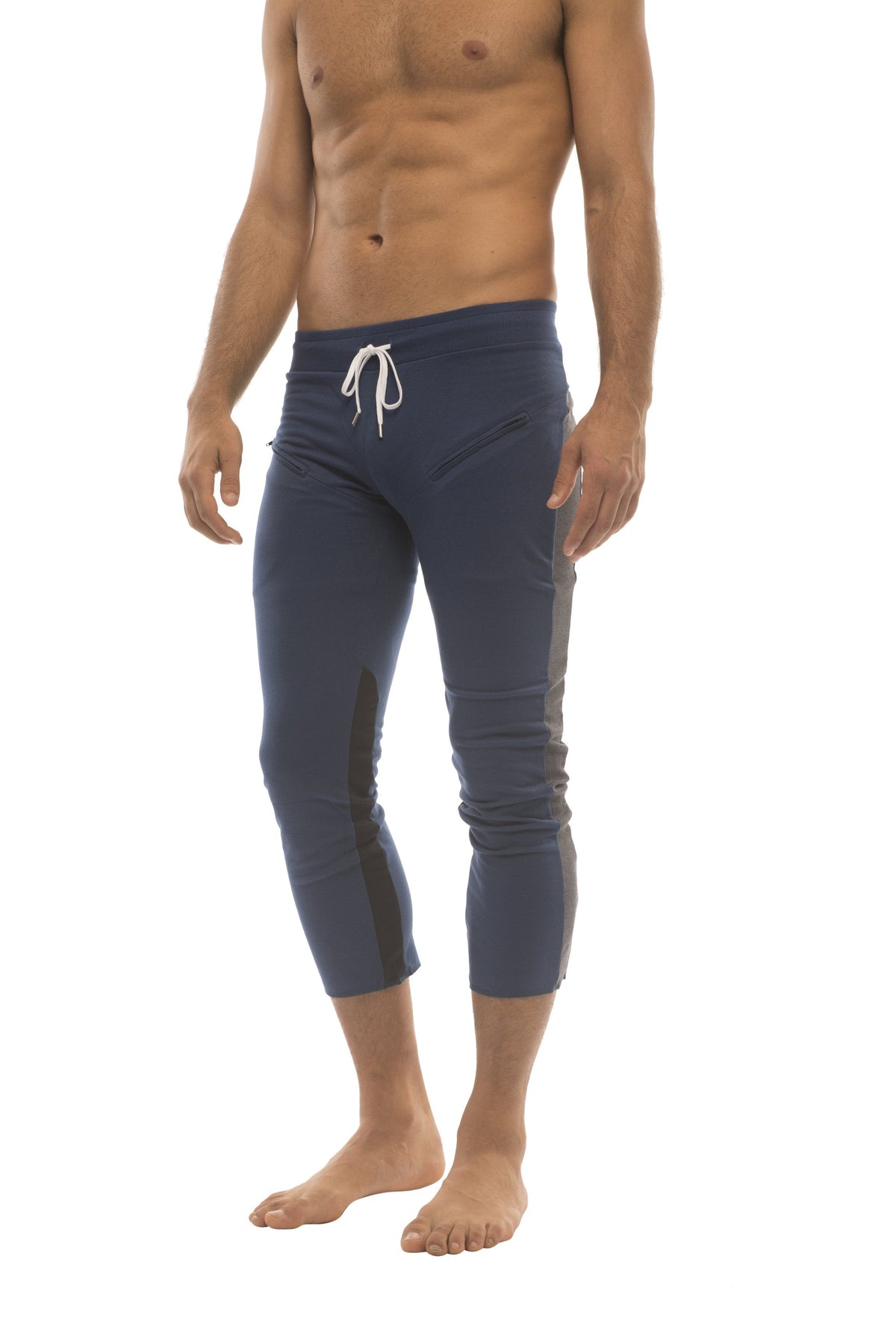 Mens 4/5 zipper pocket capri yoga pants in navy blue with white drawstring waistband and black side panels