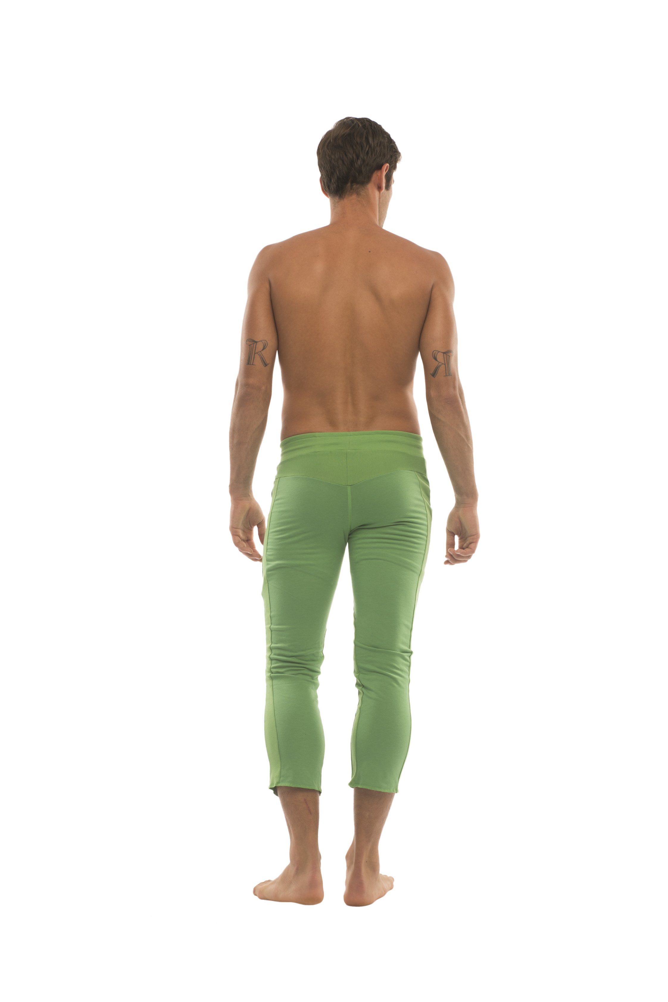 Mens 4/5 zipper pocket capri yoga pants in solid bamboo green with smooth stretchy fabric and form-fitting design