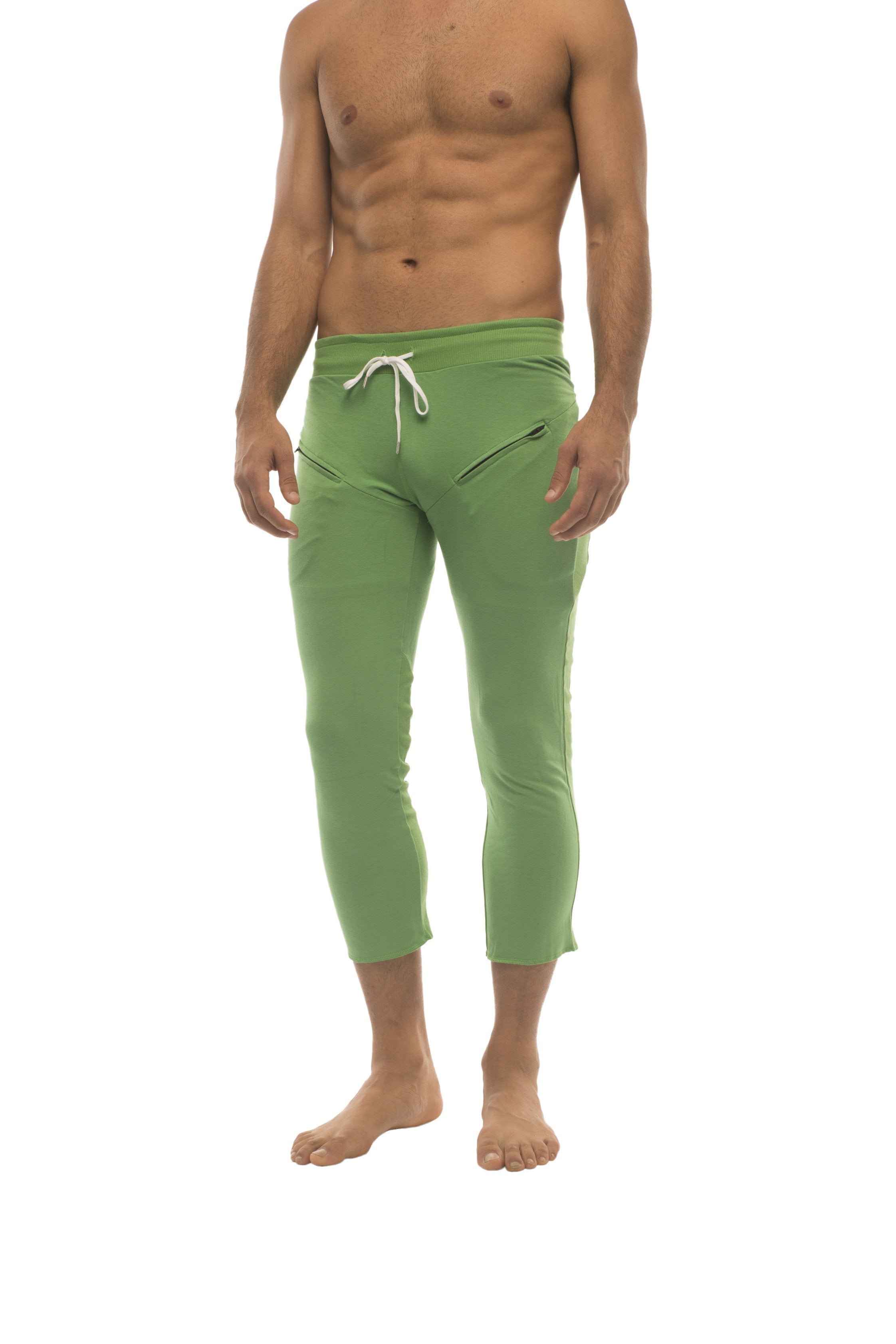 Mens solid bamboo green capri yoga pants with white drawstring waistband and side zipper pockets