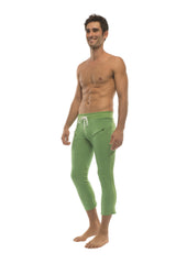 Mens 4/5 zipper pocket capri yoga pants in solid bamboo green with white drawstring waistband