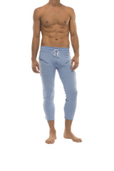 Mens solid ice blue form-fitting capri yoga pants with white drawstring waistband and side zipper pockets