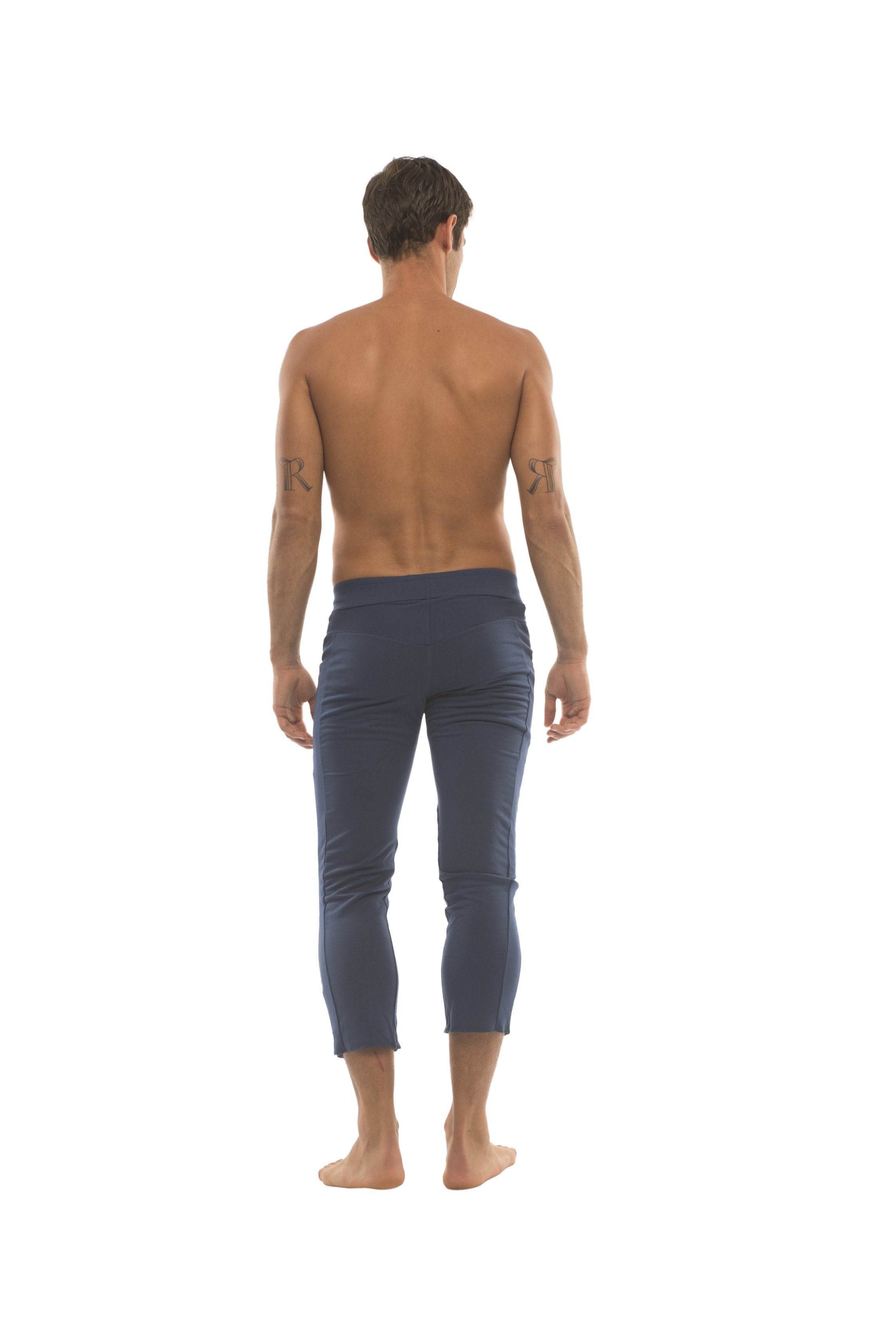 Mens navy blue cropped capri yoga pants with 4 zipper pockets designed for comfort and active wear