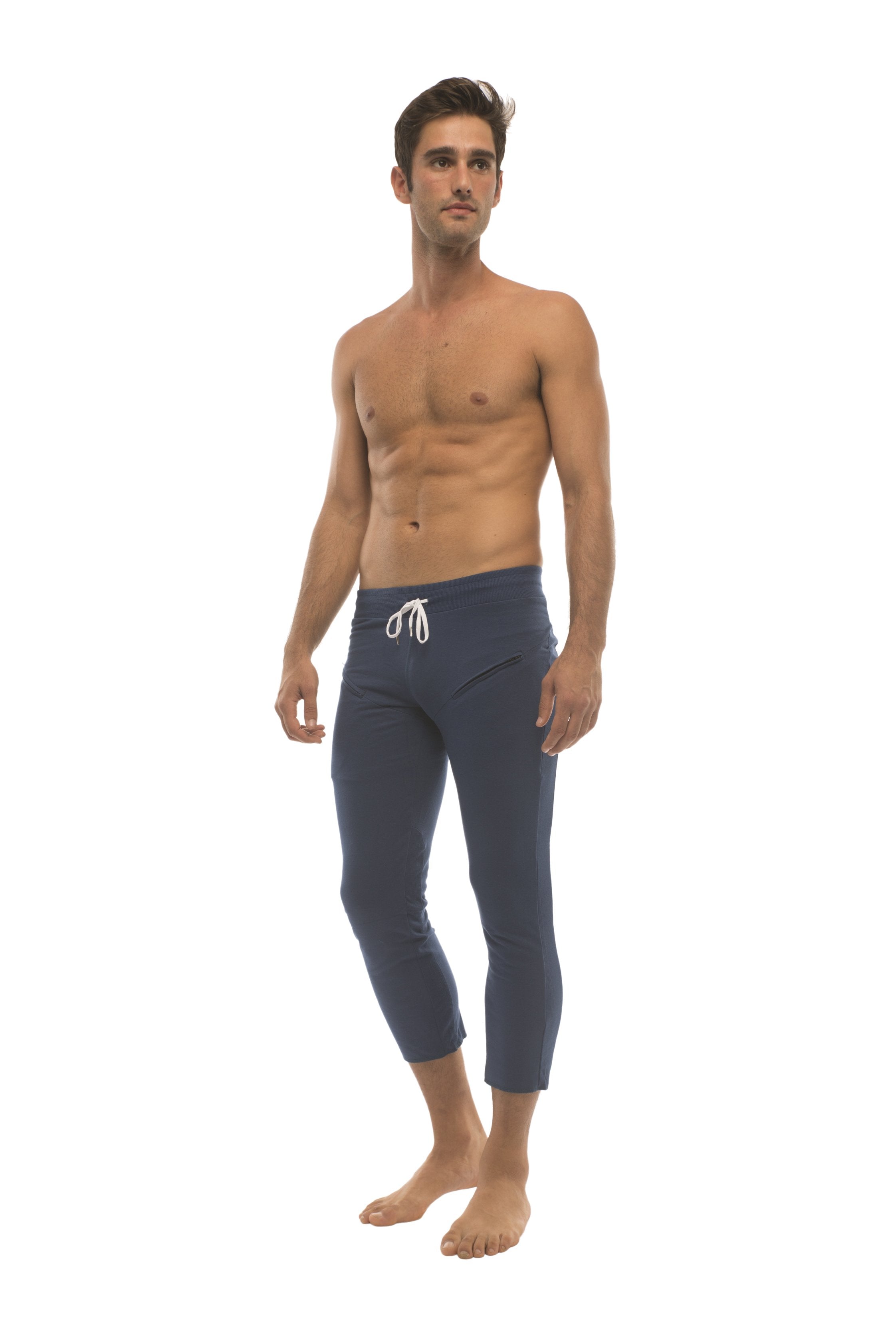 Mens navy blue capri yoga pants with white drawstring waistband and 4 5 zipper pockets for active wear