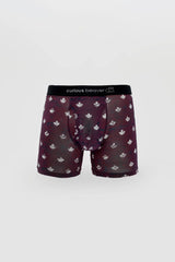 Menâ€™s maroon boxer briefs with white maple leaf pattern and black waistband branded curious beaver canada flag design