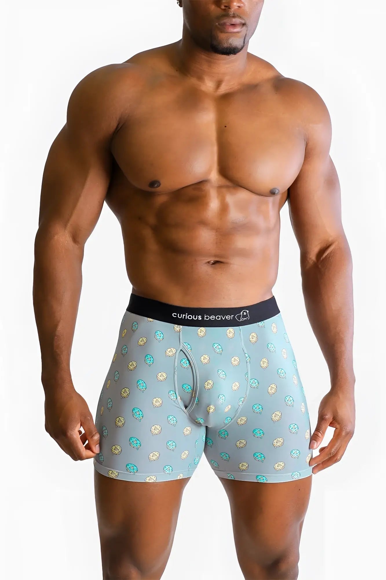 Menâ€™s light blue boxer briefs with teal and gold cartoon beaver pattern and black curious beaver waistband