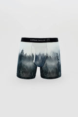 Misty forest-themed menâ€™s boxer briefs in soft translucent fabric with black elastic waistband featuring curious beaver logo