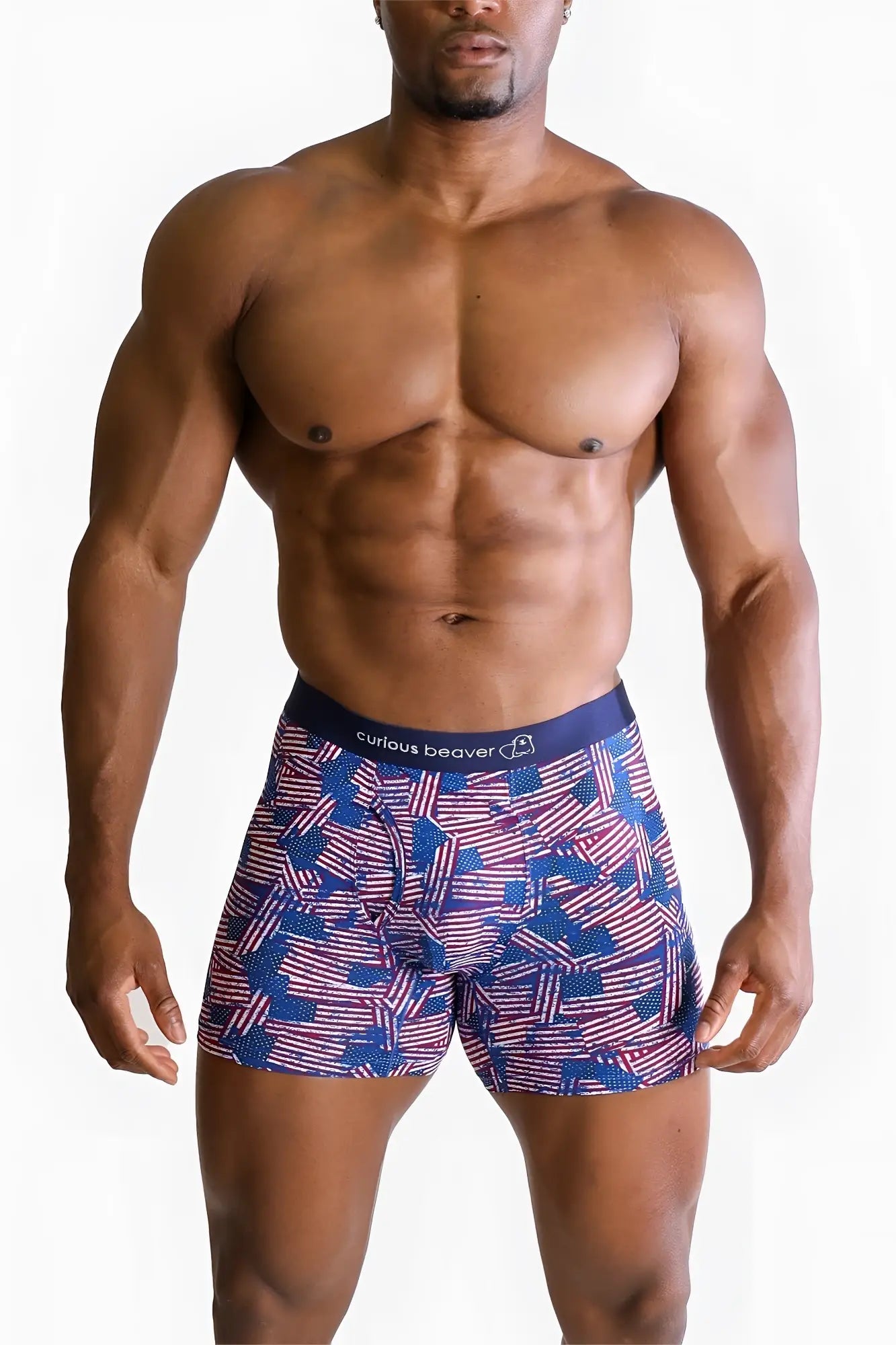 Menâ€™s boxer briefs with blue and red usa flag pattern featuring curious beaver branding on the waistband