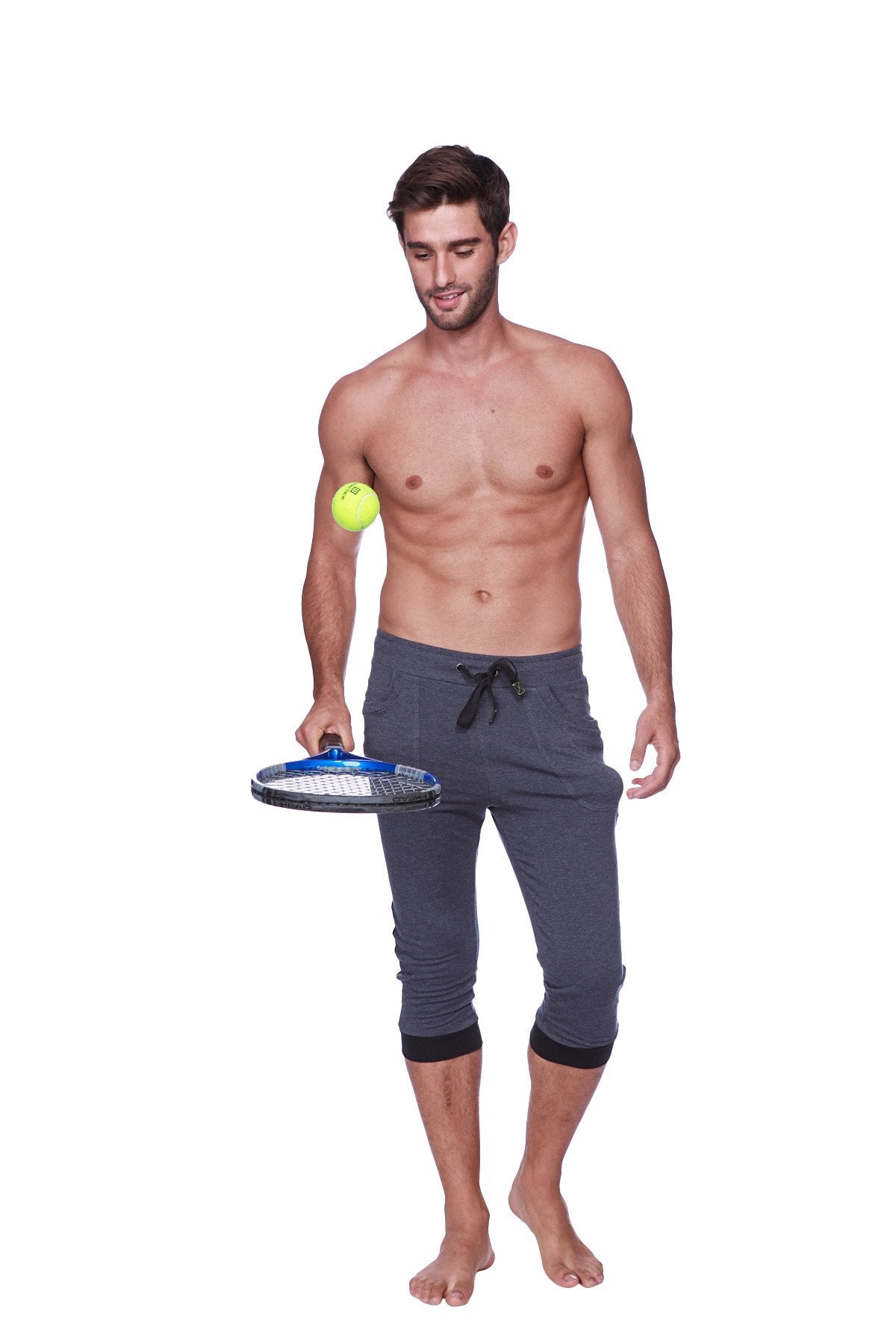 Mens cuffed yoga pants in charcoal with black drawstring elastic cuffs made of comfortable fabric for athletic use