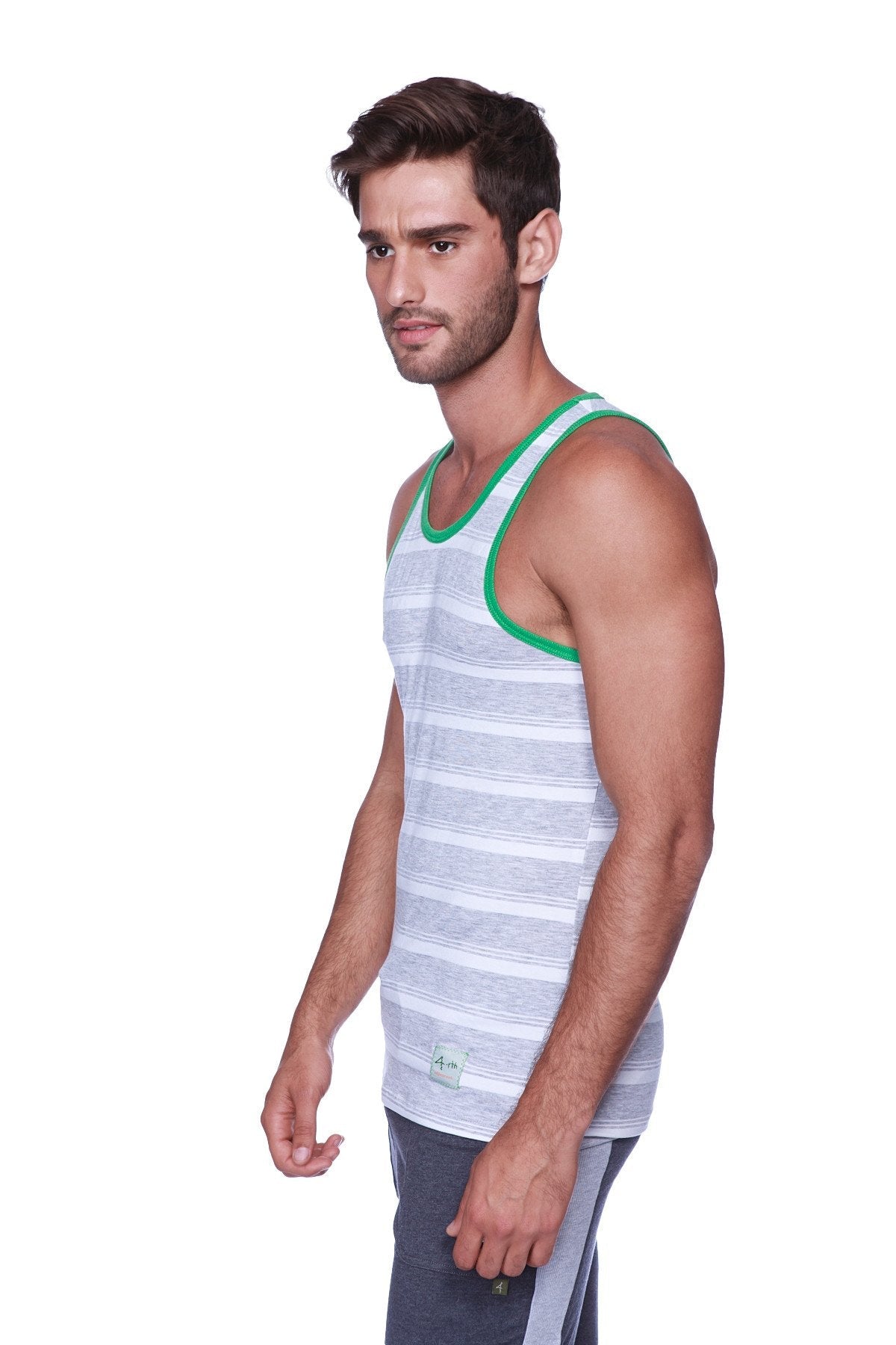 Men’s gray and white striped tank top with green neckline trim shown with charcoal and heather grey cuffed yoga pants