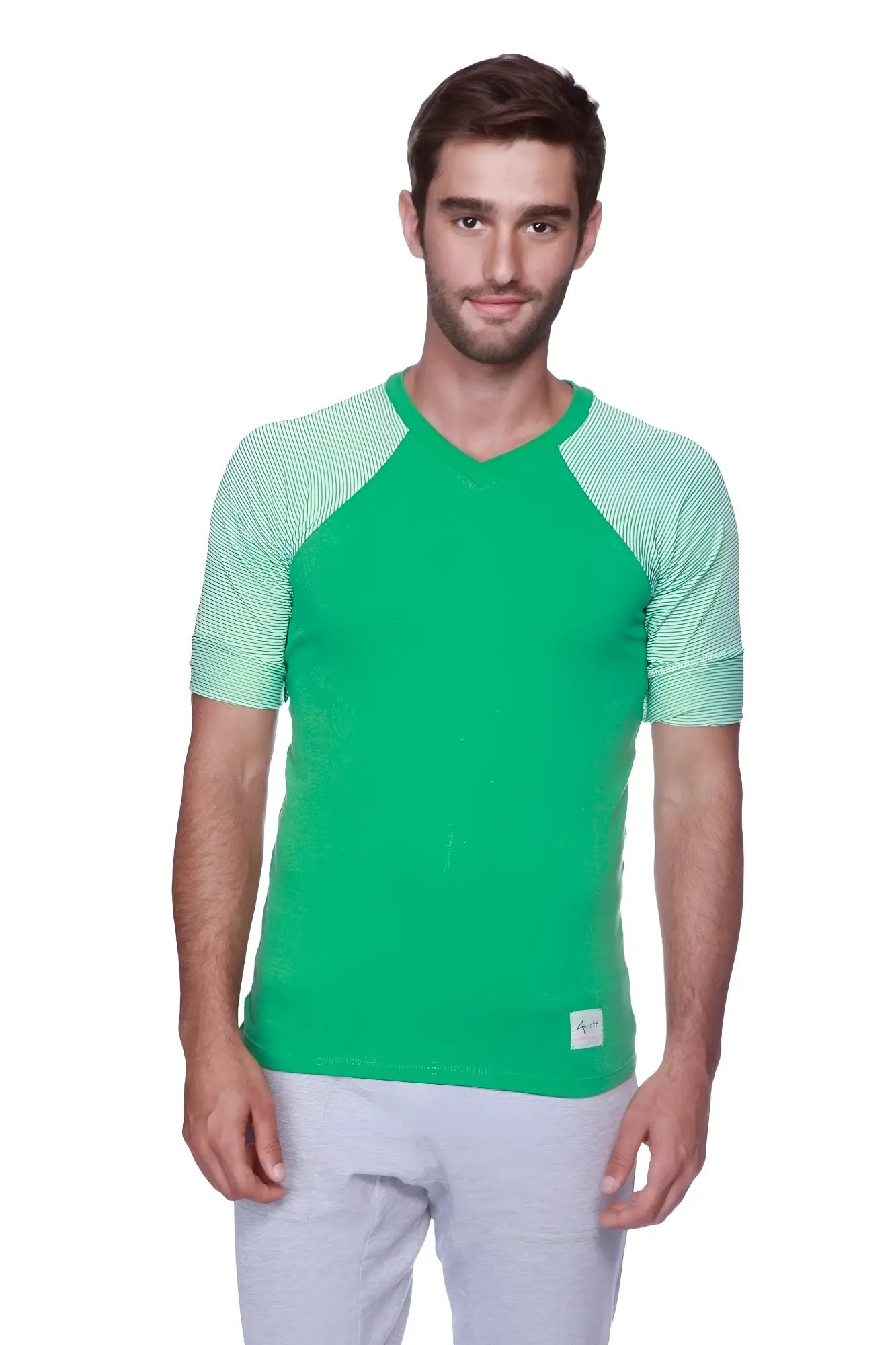 Mens green v-neck t-shirt with light green striped raglan sleeves paired with heather grey green yoga pants