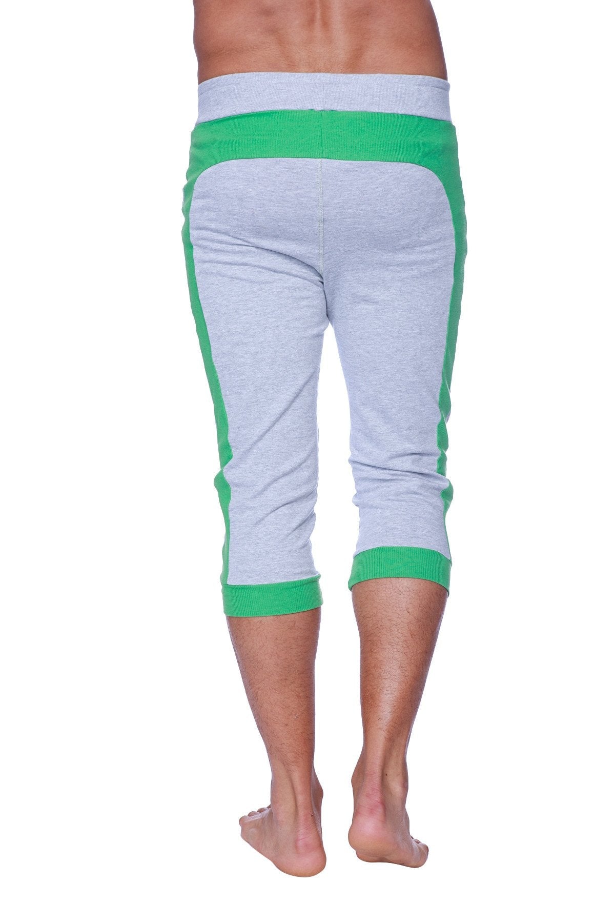 Mens cuffed yoga pants in heather grey with green capri-length sweatpants featuring ribbed cuffs and waistband