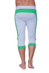 Mens cuffed yoga pants in heather grey with green capri-length sweatpants featuring ribbed cuffs and waistband