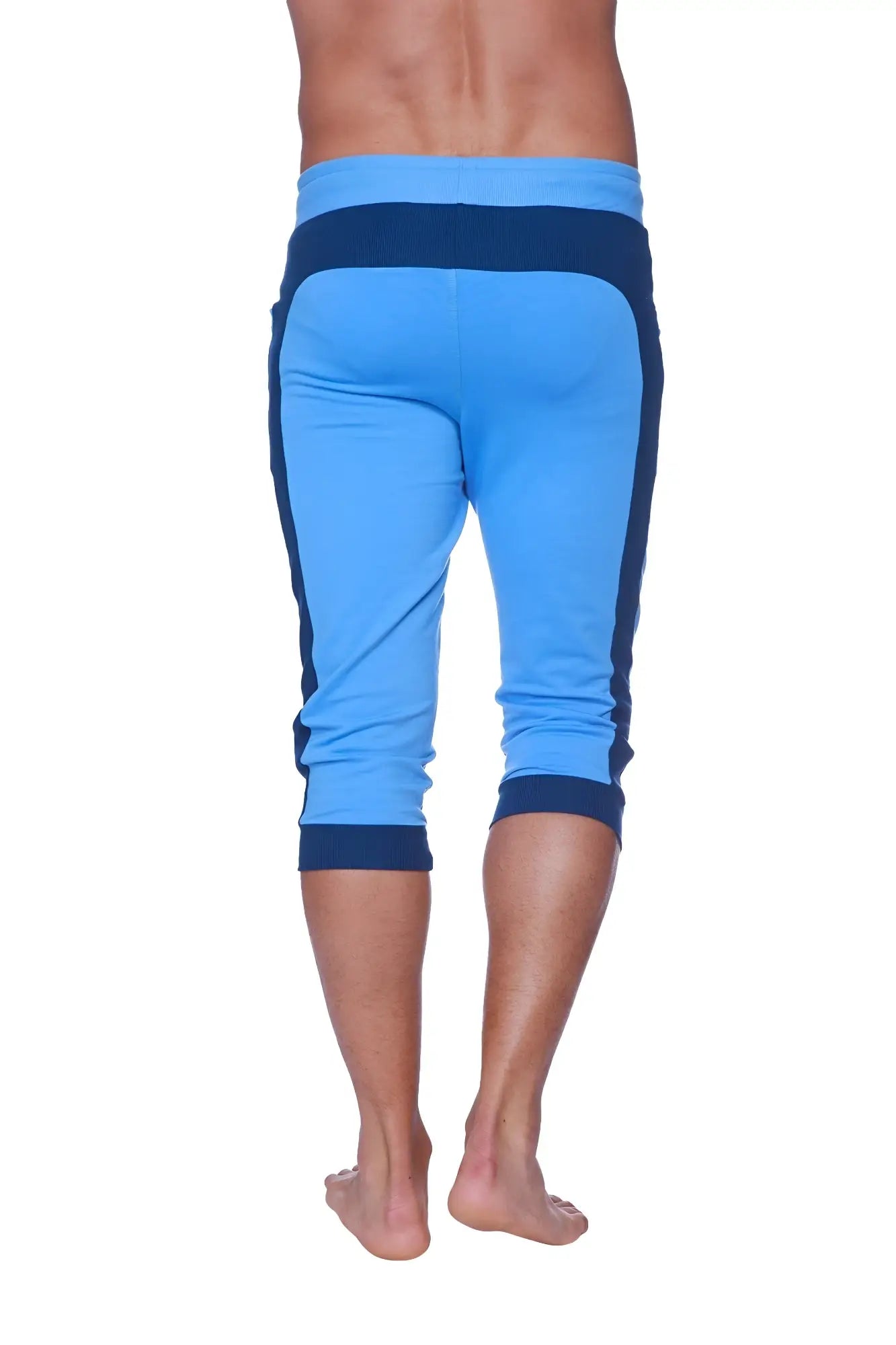 Mens cuffed yoga pants in ice blue with royal blue contrasting side stripes designed for athletic use