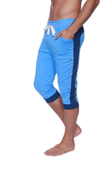 Mens cuffed yoga capri pants in ice blue and royal blue with a white drawstring waistband for athletic use