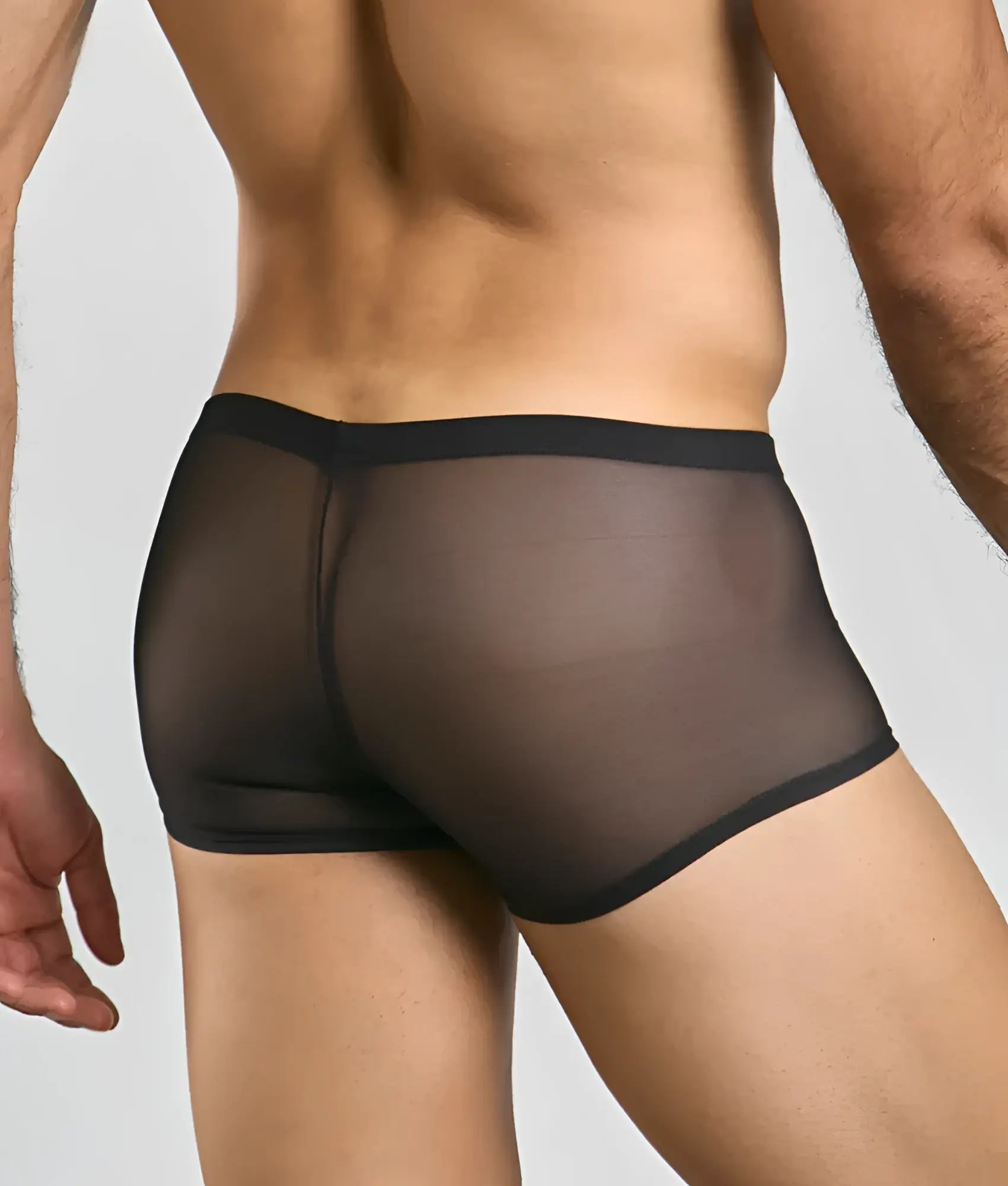 Men’s mesh lace pouch trunk in black sheer mesh with solid black waistband showing front view