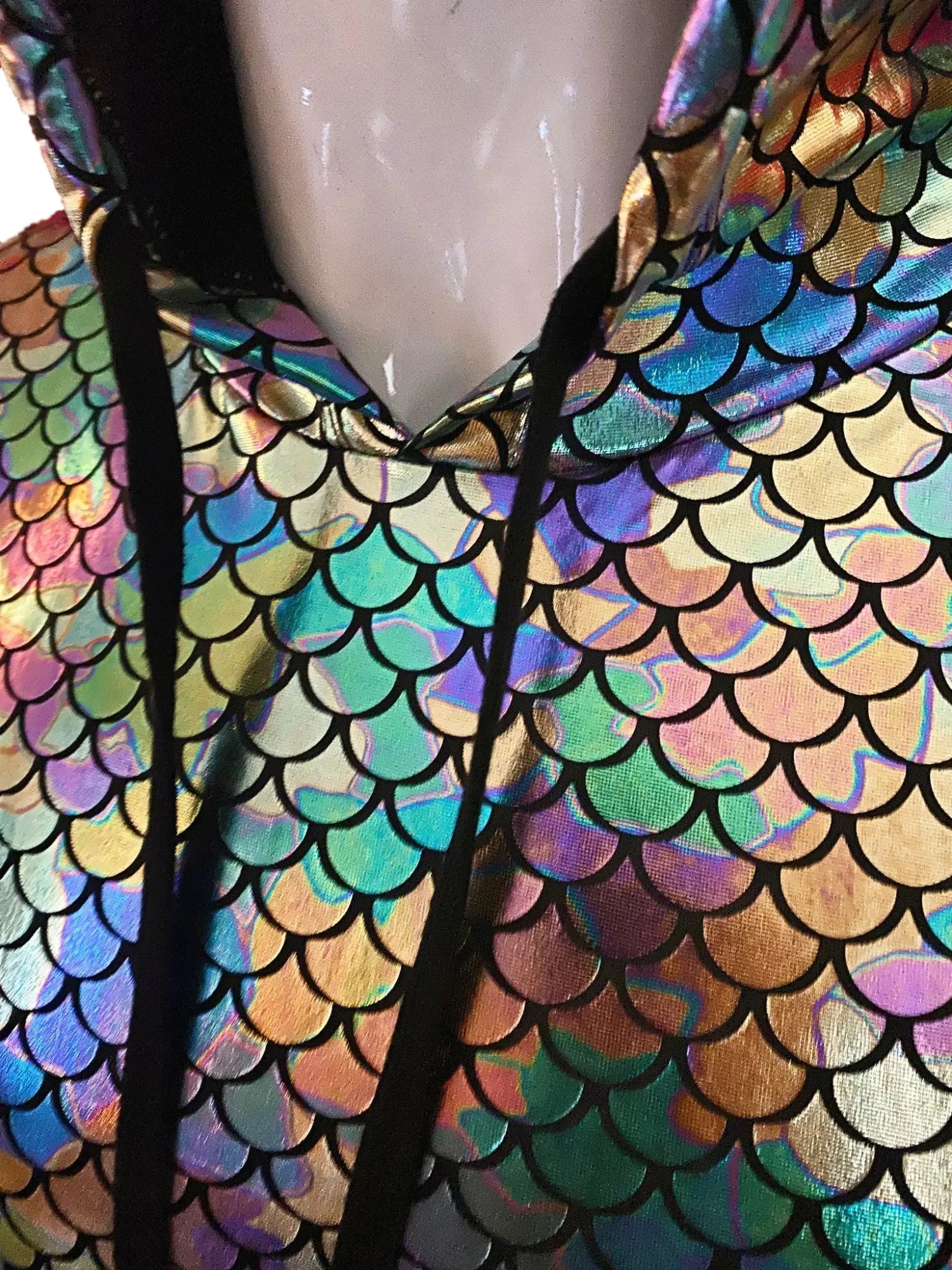Merman hooded crop tank in a shimmering iridescent scale pattern with rainbow hues and black outlines