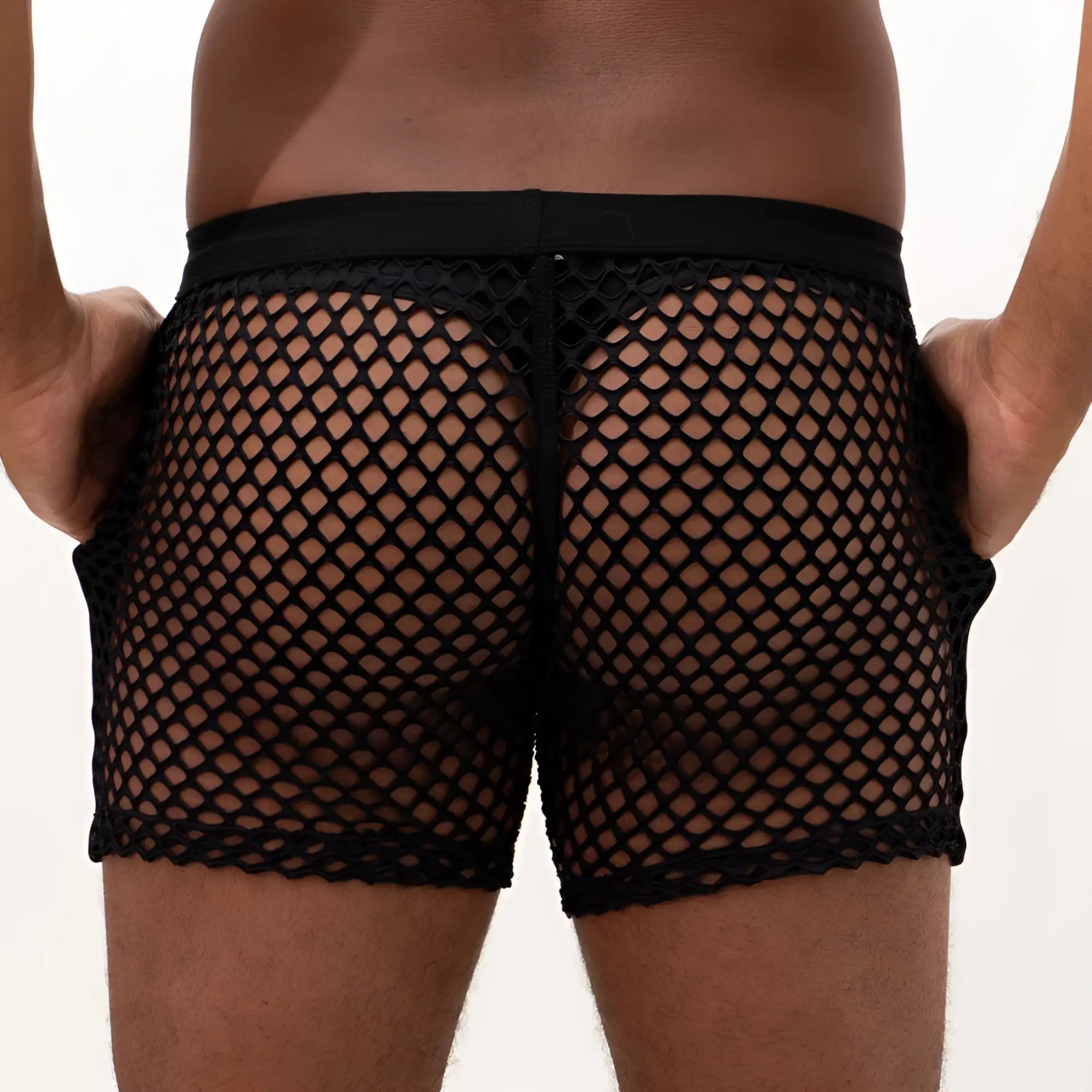 Black mesh swim trunks with a solid waistband shown from the back in the mesh back short style