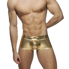 Shiny gold metallic boxer briefs with a sleek form-fitting design and subtle logo on the waistband