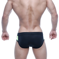 Black swim trunks with neon green side panels from metromalewear alonzo swim brief green 4997-07 for men