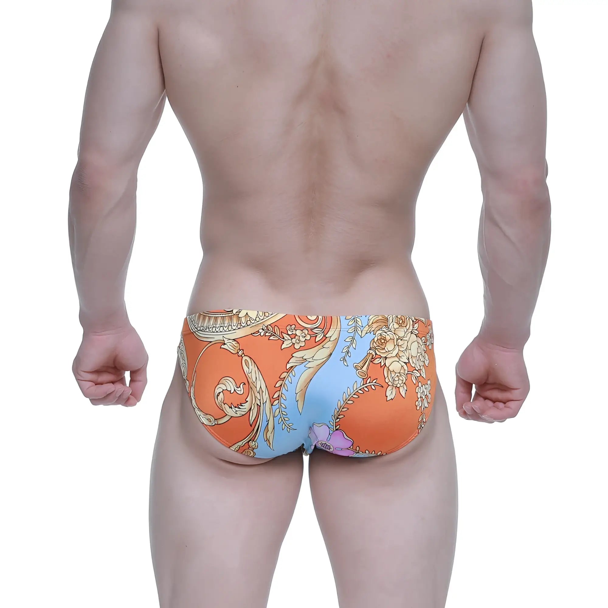 Orange and blue patterned swim trunks with ornate floral design from metro male wear antique bikini 5103-m68