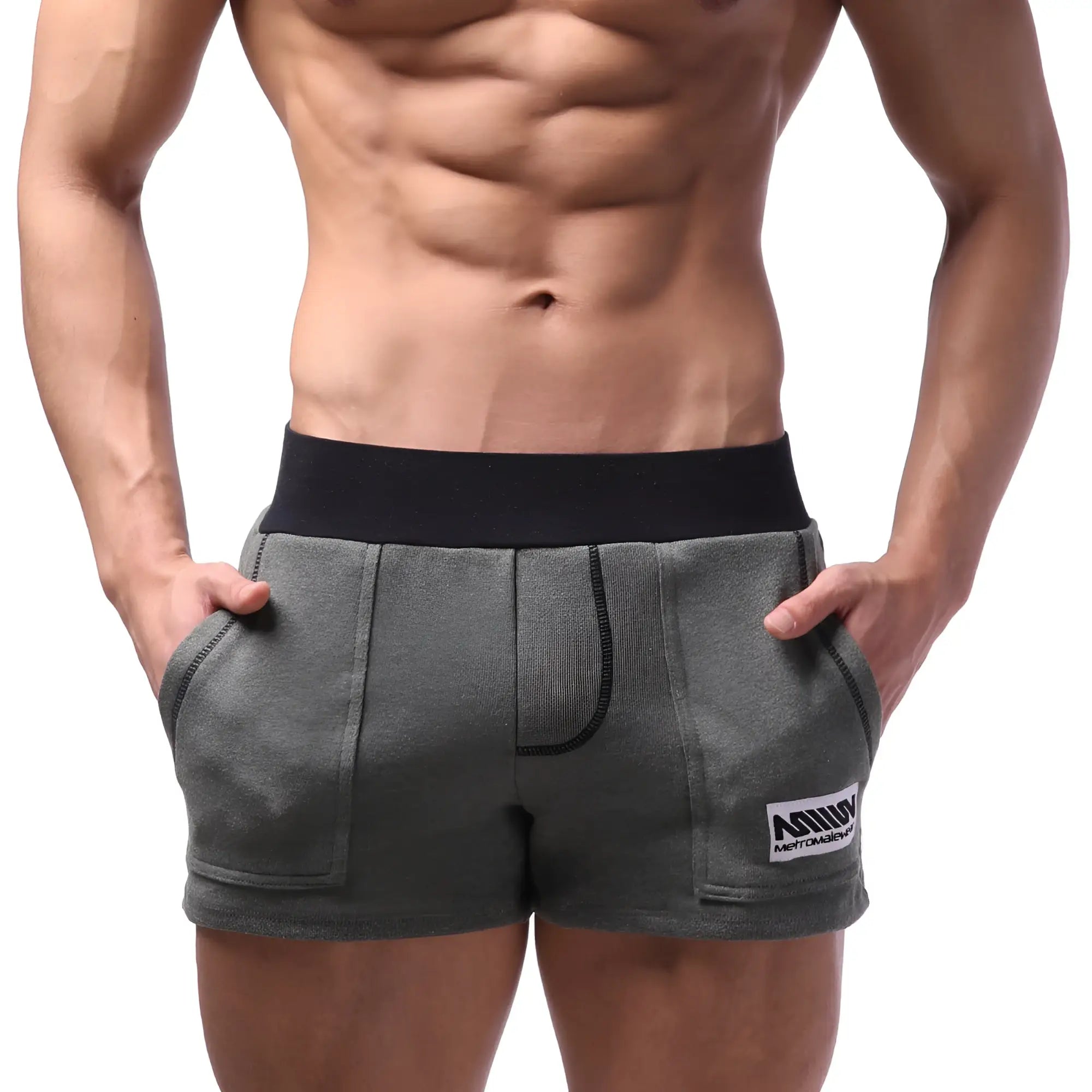 Gray metro malewear boston athletic shorts with black elastic waistband and white logo patch on lower right leg