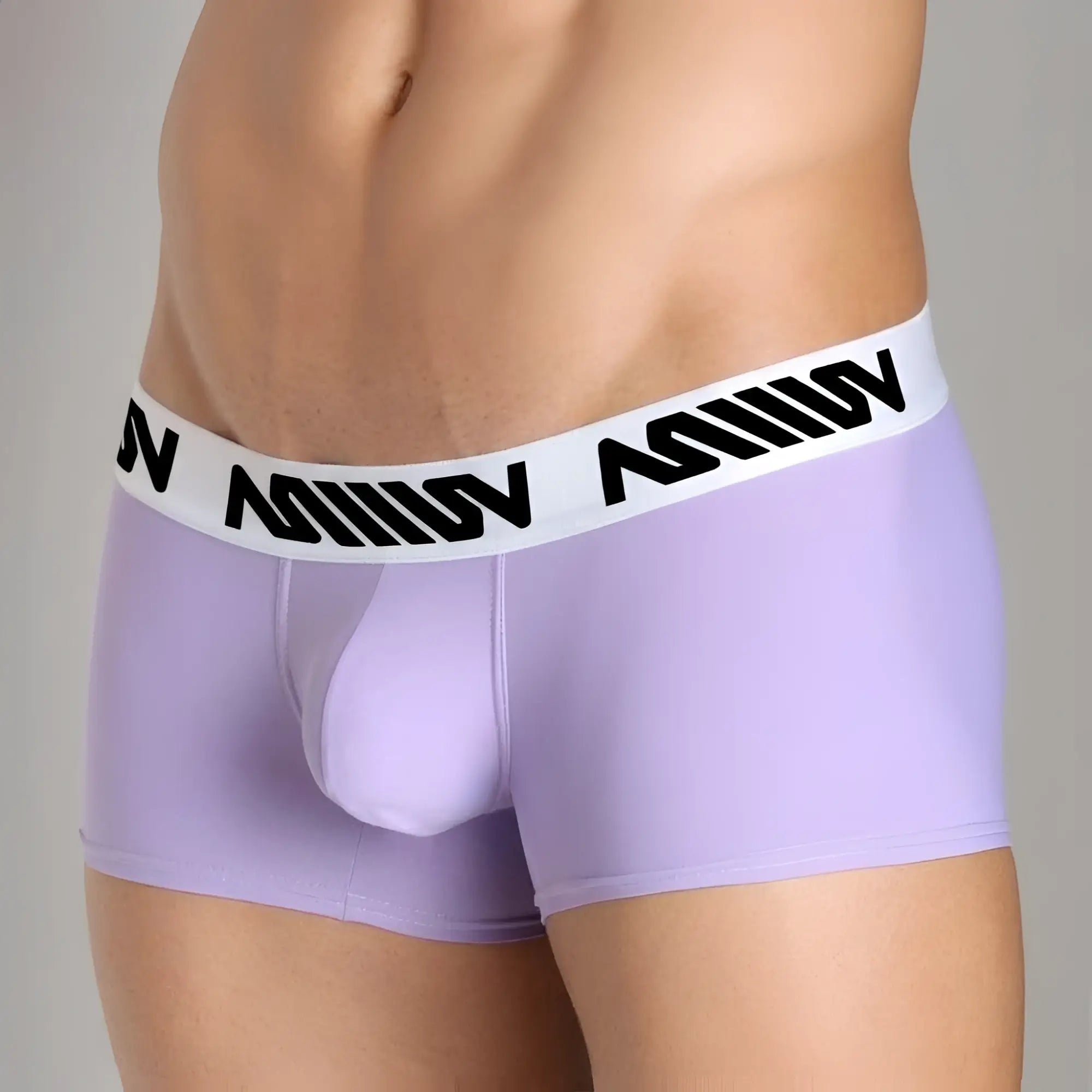 Lavender metro malewear bulge boxer briefs with white elastic waistband and black stylized lettering in polyester blend