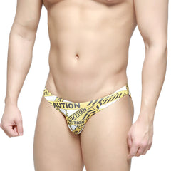 Yellow and white caution tape patterned lowrise bikini thong by metromalewear shown from the back