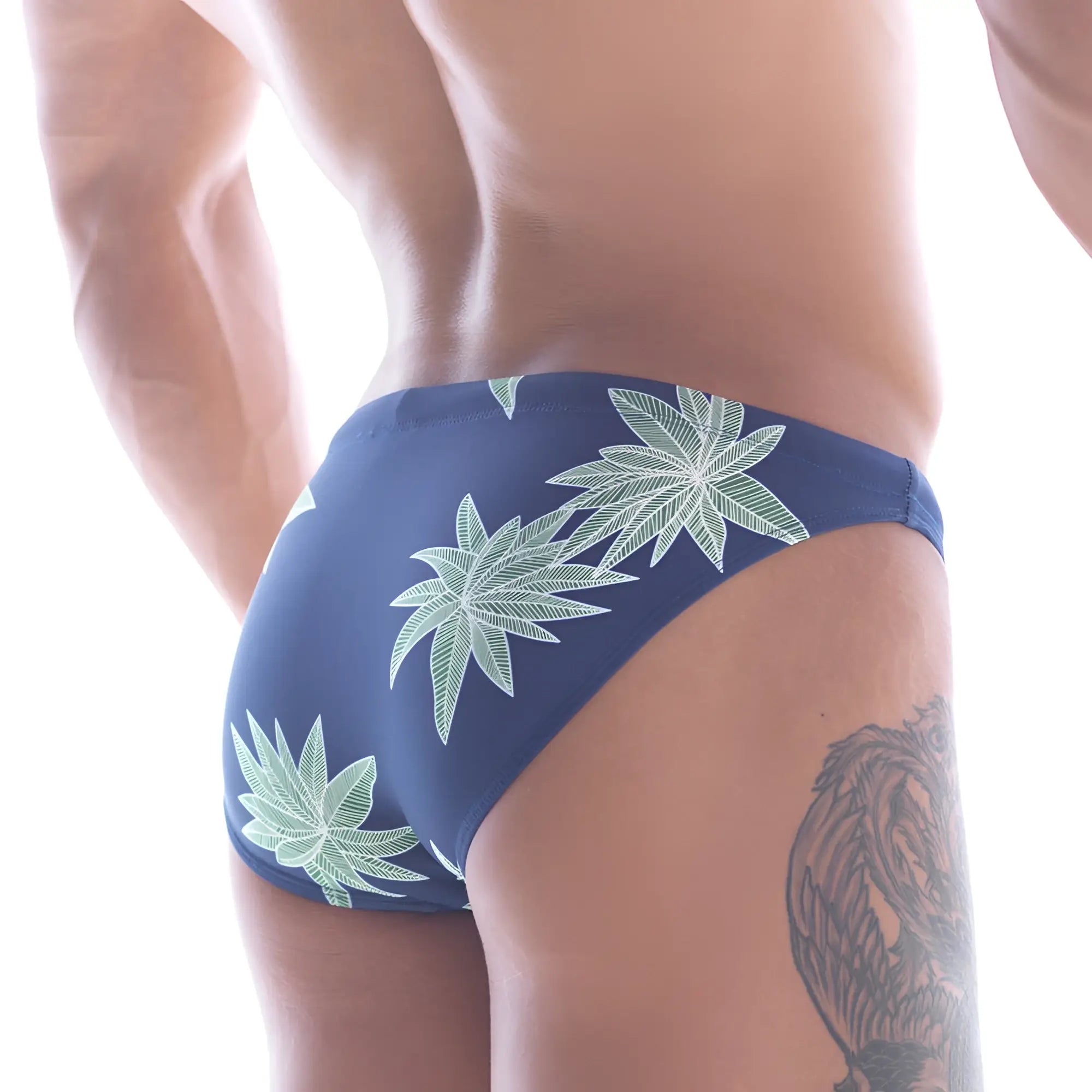 Navy blue metro malewear classic swim bikini beach trunks with light green cannabis leaf pattern for beach use