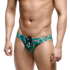MetroMaleWear classic swim bikini jungle 4937-08 tropical leaf-patterned swim trunks in teal and green with black drawstrings