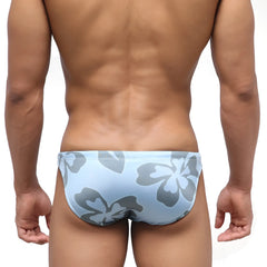 Light blue MetroMaleWear classic swim bikini with bold gray hibiscus flower pattern for beachwear