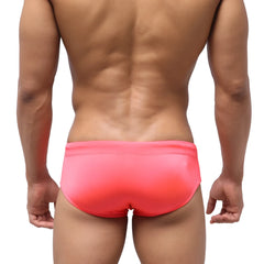 MetroMaleWear classic swim brief in hot pink with a smooth form-fitting design ideal for swimming and beachwear