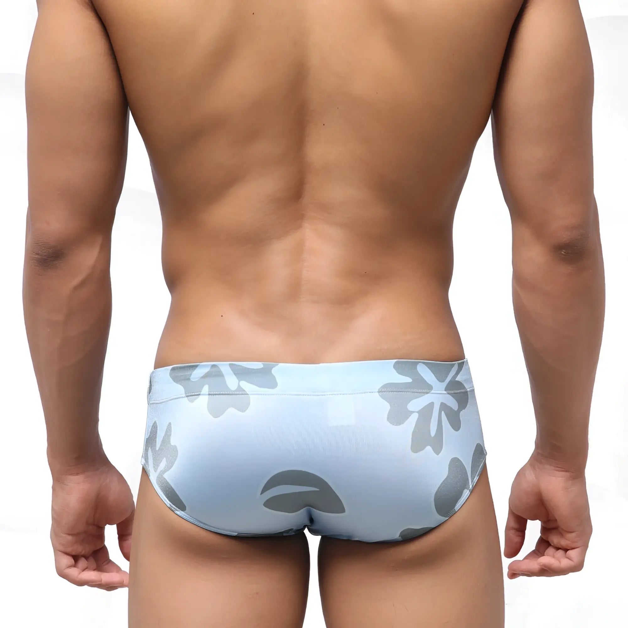 Light blue metroMalewear classic swim brief with gray floral pattern ideal for beach and pool use