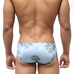 Light blue metroMalewear classic swim brief with gray floral pattern ideal for beach and pool use