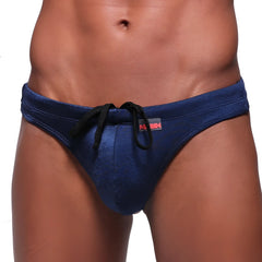 MetroMalewear classic navy swim thong 4902-28 textured with black drawstring and red logo tag for men
