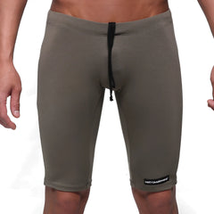 Olive green cotton athletic shorts with black drawstring and metromalewear logo patch on lower right leg
