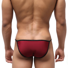 Red thong with black trim swim bikini by metromalewear in wine color showcasing bold design and fit