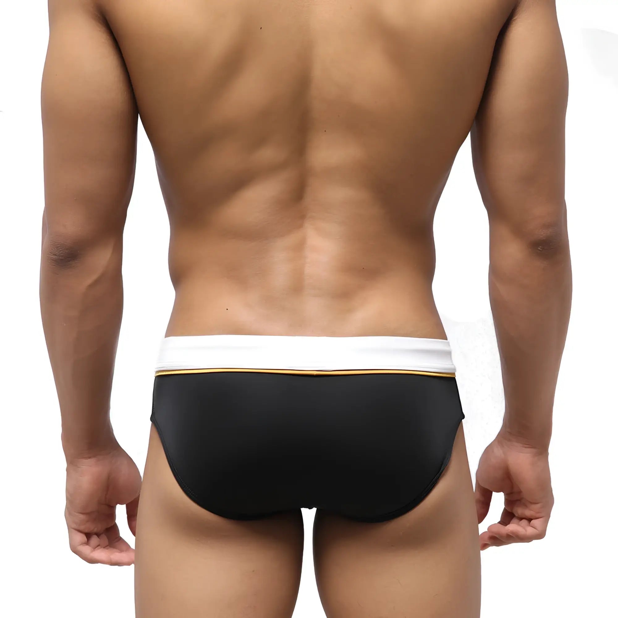 MetroMaleWear Edge swim brief in black with a white waistband and thin gold trim designed for swimming